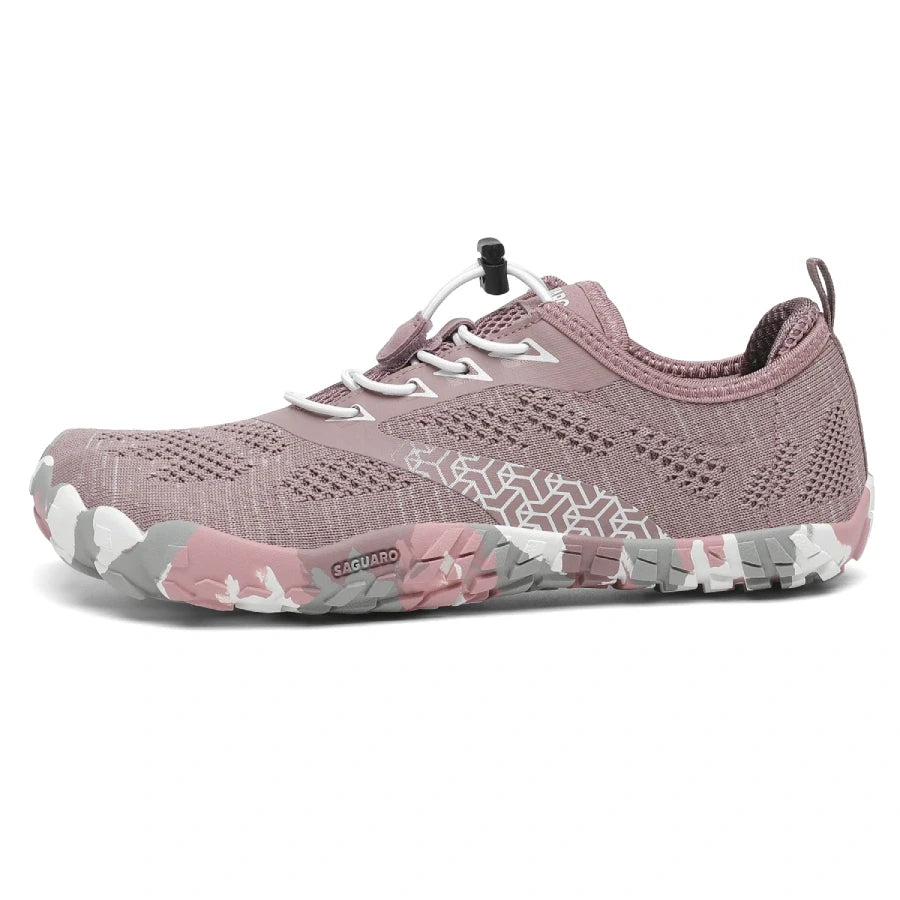 Zapatilla Smart II rosa coral destacando estructura flexible ergonómica.