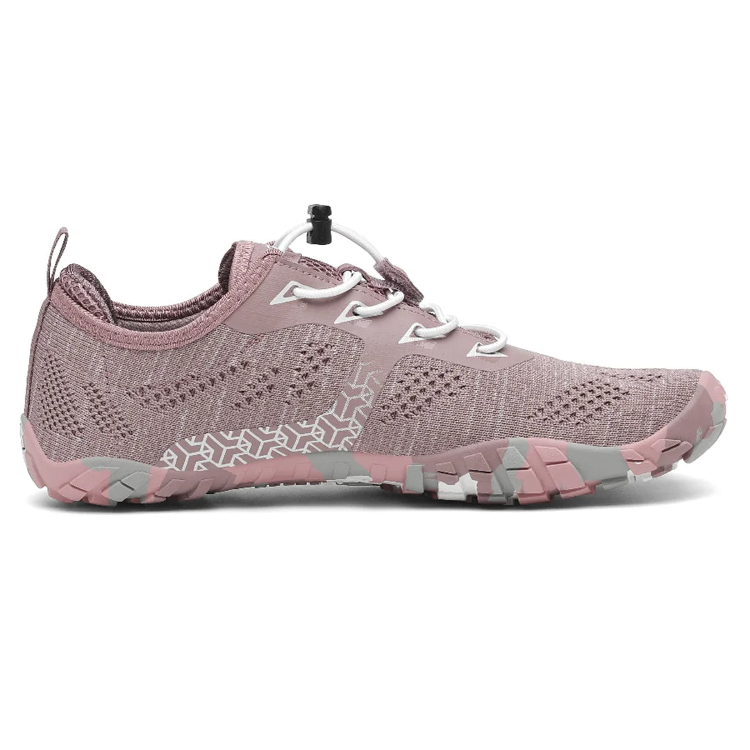 Zapatilla Smart II rosa coral vista lateral destacando estructura flexible ergonómica.