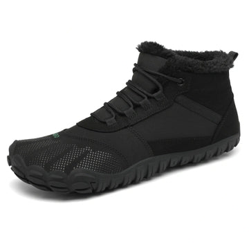 Bota Saguaro Will I negra vista lateral mostrando diseño barefoot de invierno.