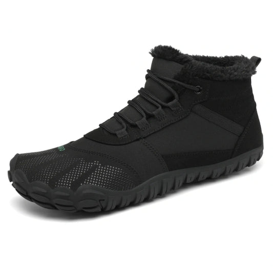 Bota Saguaro Will I negra vista lateral mostrando diseño barefoot de invierno.