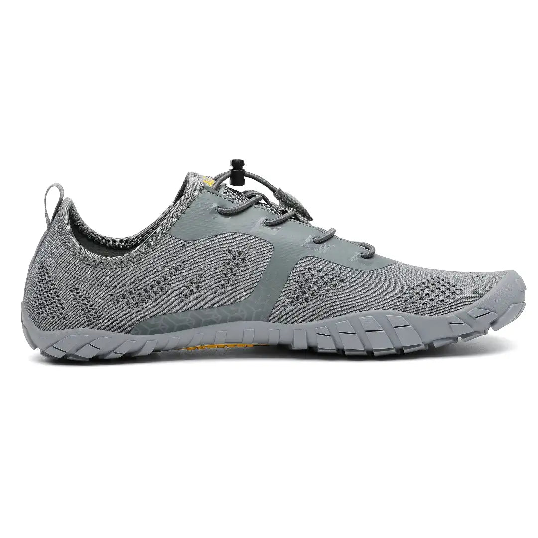 Zapatillas Smart I grises vista lateral interna mostrando tejido respirable.
