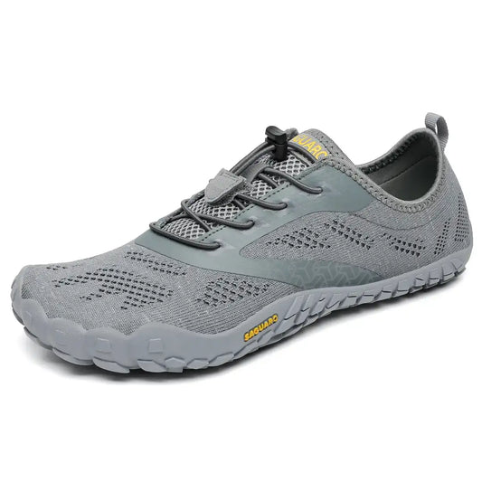 Zapatillas Saguaro Smart I grises vista lateral con diseño barefoot minimalista.