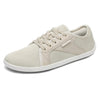 Zapatilla minimalista Luck II color crema, puntera ancha y zero drop.