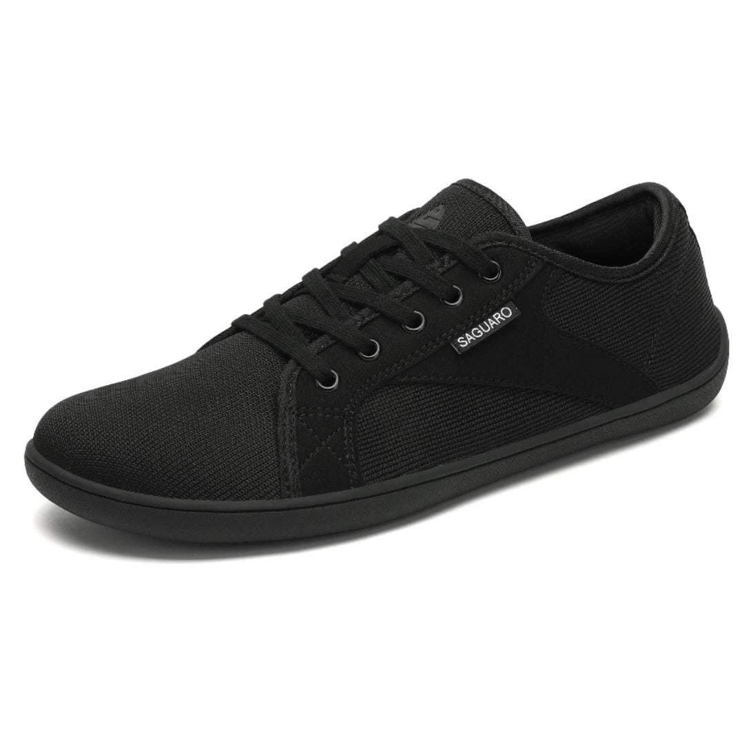 Zapatilla minimalista Saguaro negra, puntera ancha y zero drop.